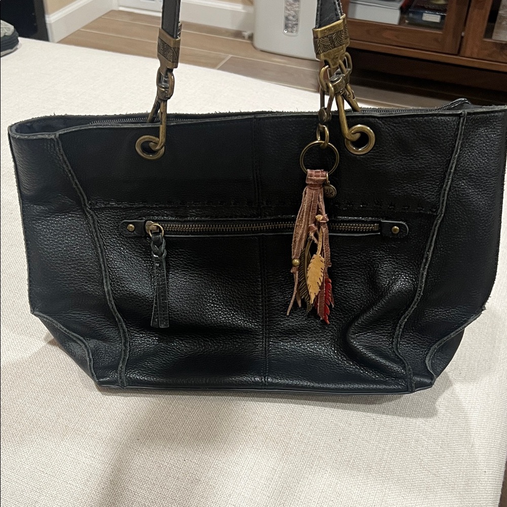 The Sak Black Leather Shoulder Bag with Feather Accents